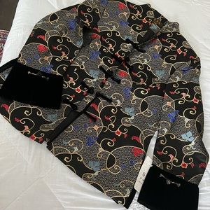 Chinese stile woman 100%silk multicoloured, size 10 jacket. Button close,